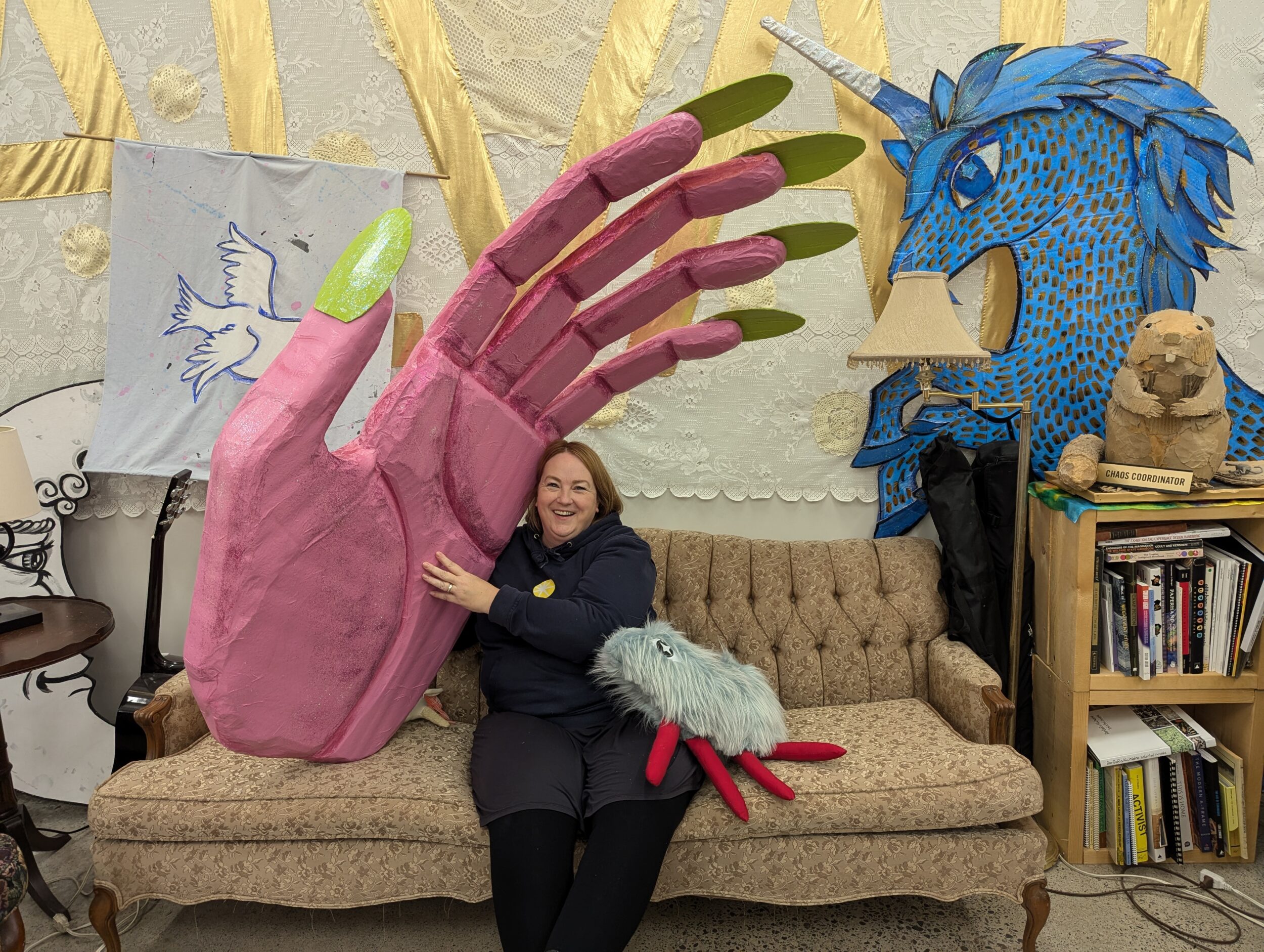 <p>Artistic Director Krista Dalby with some of the Department of Illumination’s creations (Chris Fanning/Gazette Staff)</p>
