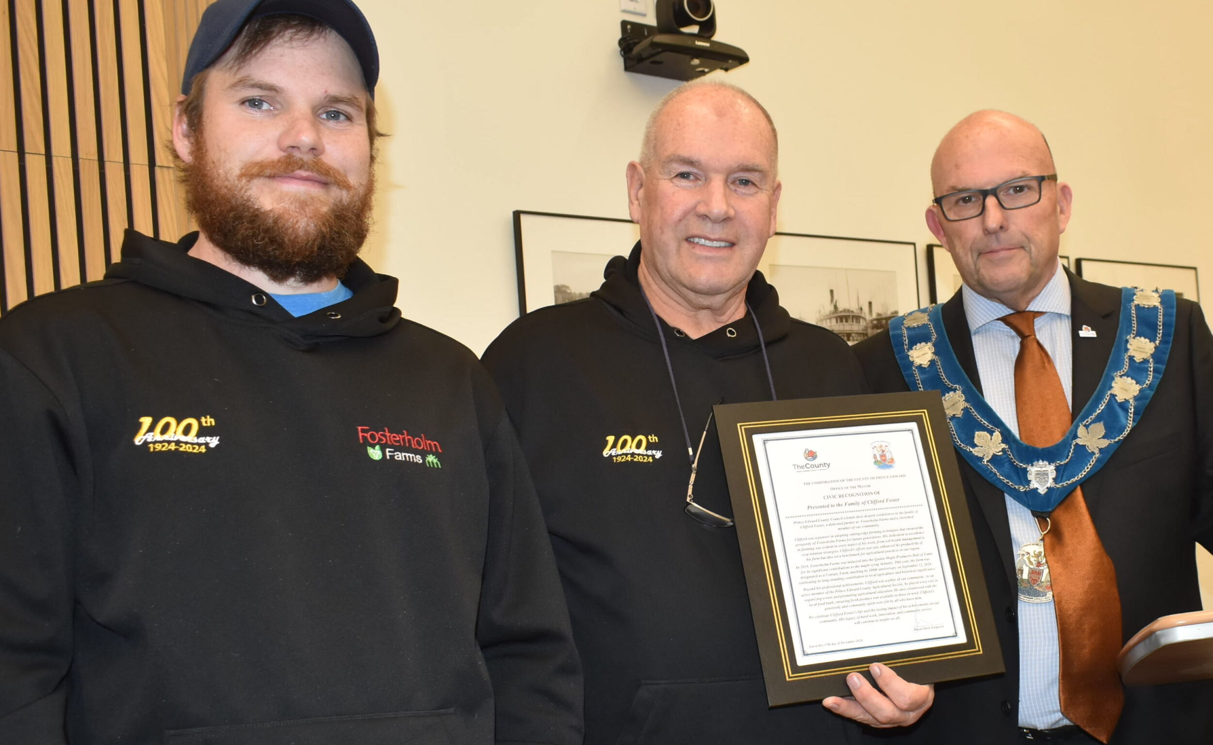 <p>Ryland and Dean Foster of Fosterholm Farms and Mayor Steve Ferguson. (Jason Parks/Gazette Staff)</p>
