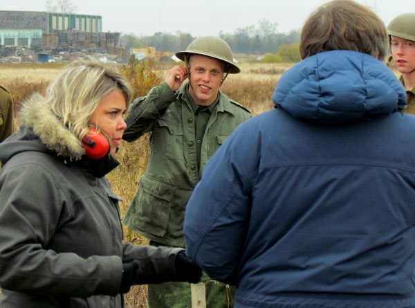 <p>In 2013, Yap Films Inc. of Toronto created a documentary about Camp X, the name given to a paramilitary and commando training centre between Whitby and Oshawa. Its exterior and interior sets use Base31’s authentic 1940s appearance. Picton’s Taylor Terpstra listens to director Robin Bicknell and art director Peter Twist, discuss the scene. (Countylive)</p>
