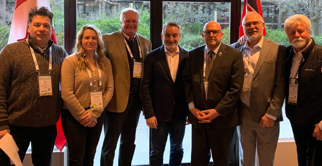 <p>(Centre) Minister of Municipal Affairs and Housing Paul Calandra meets with County of Prince Edward<br />
Councillors (From Left) Sam Grosso, Sam Branderhorst, Chris Braney, Mayor Steve Ferguson,<br />
Councillors Phil St. Jean and Bill Roberts at the 2025 ROMA conference. (Submitted Photo)</p>

