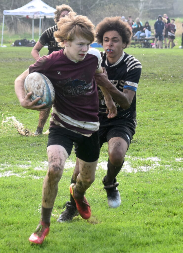 <p>PECI’s Jaydon Hass and his teammates play in the Jr. Boys COSSA rugby championships today at Mary Ann Sills park in Belleville. (Jason Parks/Gazette Staff)</p>
