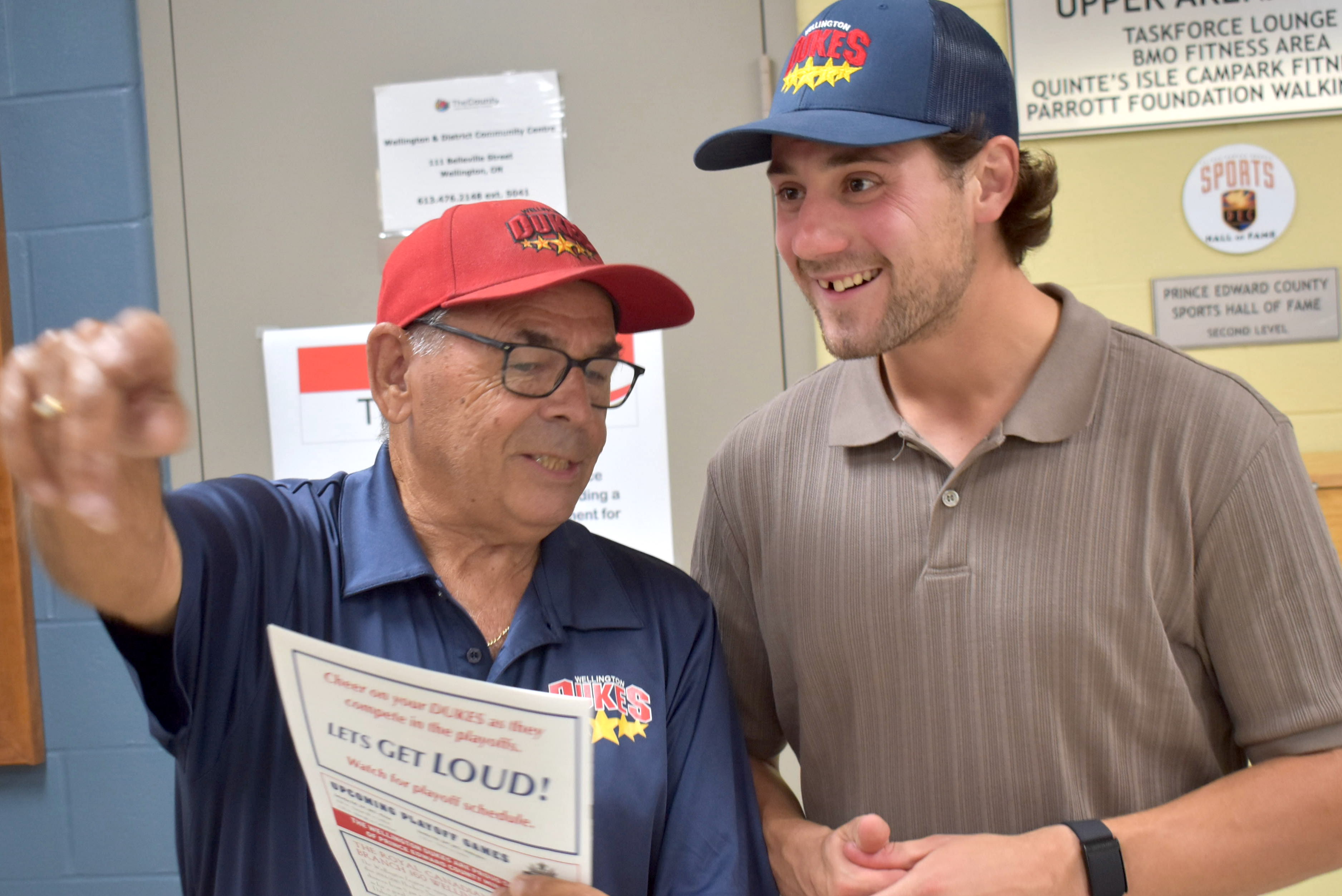<p>Dukes fan Robert Baitley and head coach Jacob Panetta reminisce about glory days during a meet and greet with the new Wellington bench boss July 25. (Jason Parks/Gazette Staff) </p>
