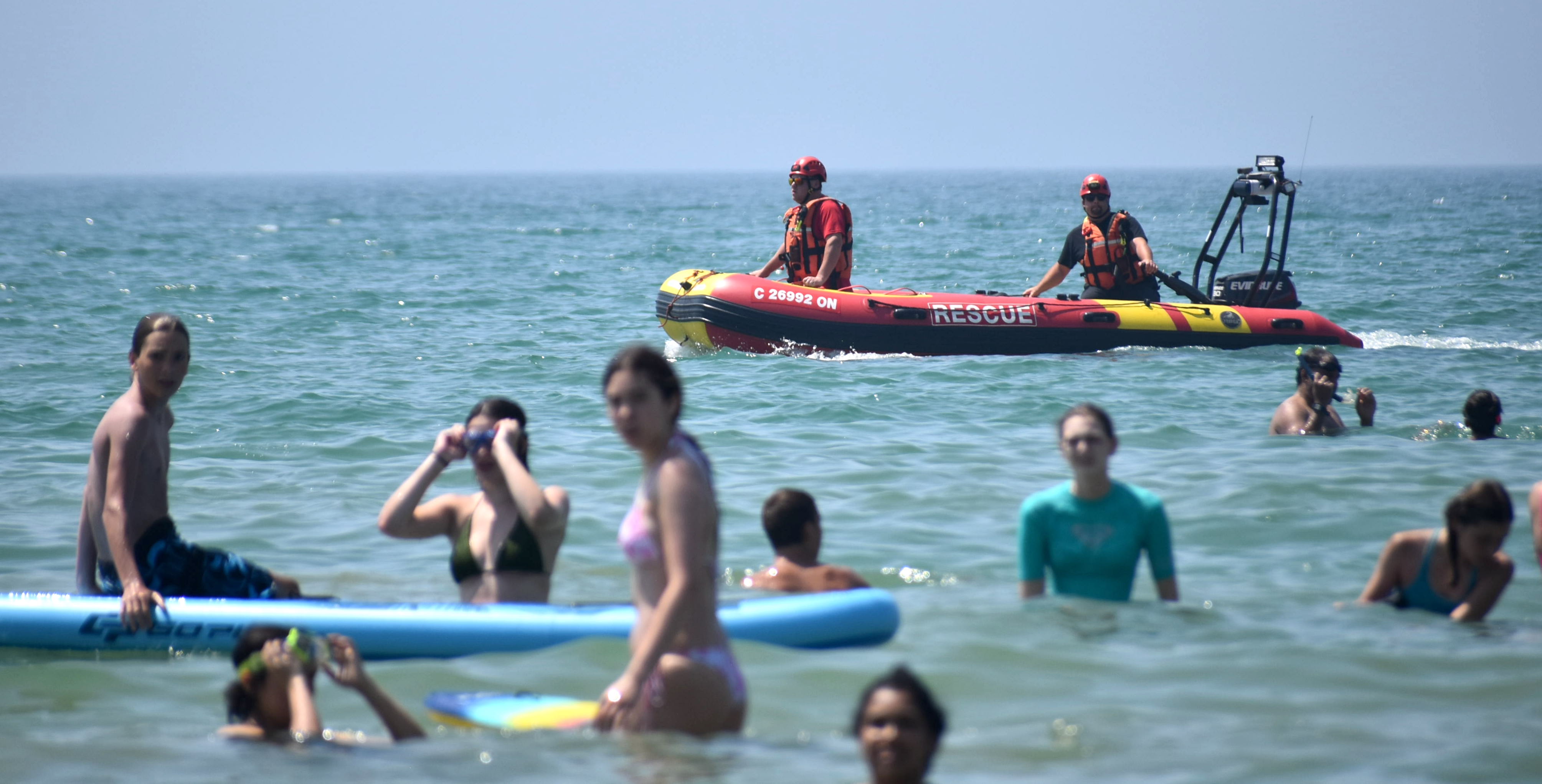 <p>Prince Edward Fire &#038; Rescue workers search for a pair of missing swimmers July 28. (Jason Parks/Gazette Staff)</p>

