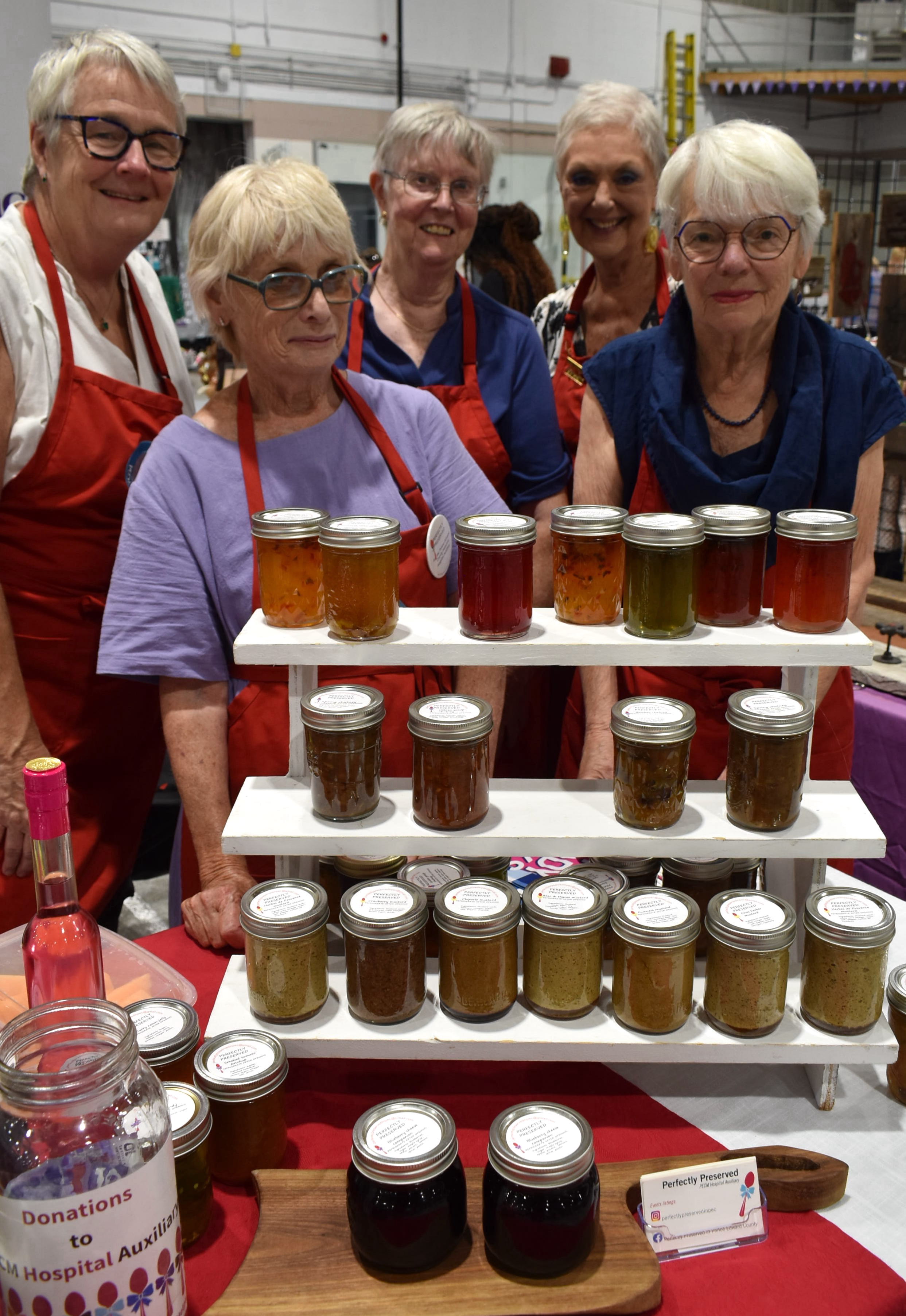 <p>Business at the Perfectly Preserved stall was brisk at the annual PEC Art and Craft Show on July 31. Sales of the group’s delectable preserves, jams and marmalades support the Prince Edward County Memorial Hospital Auxiliary.  (Jason Parks/Gazette Staff)</p>
