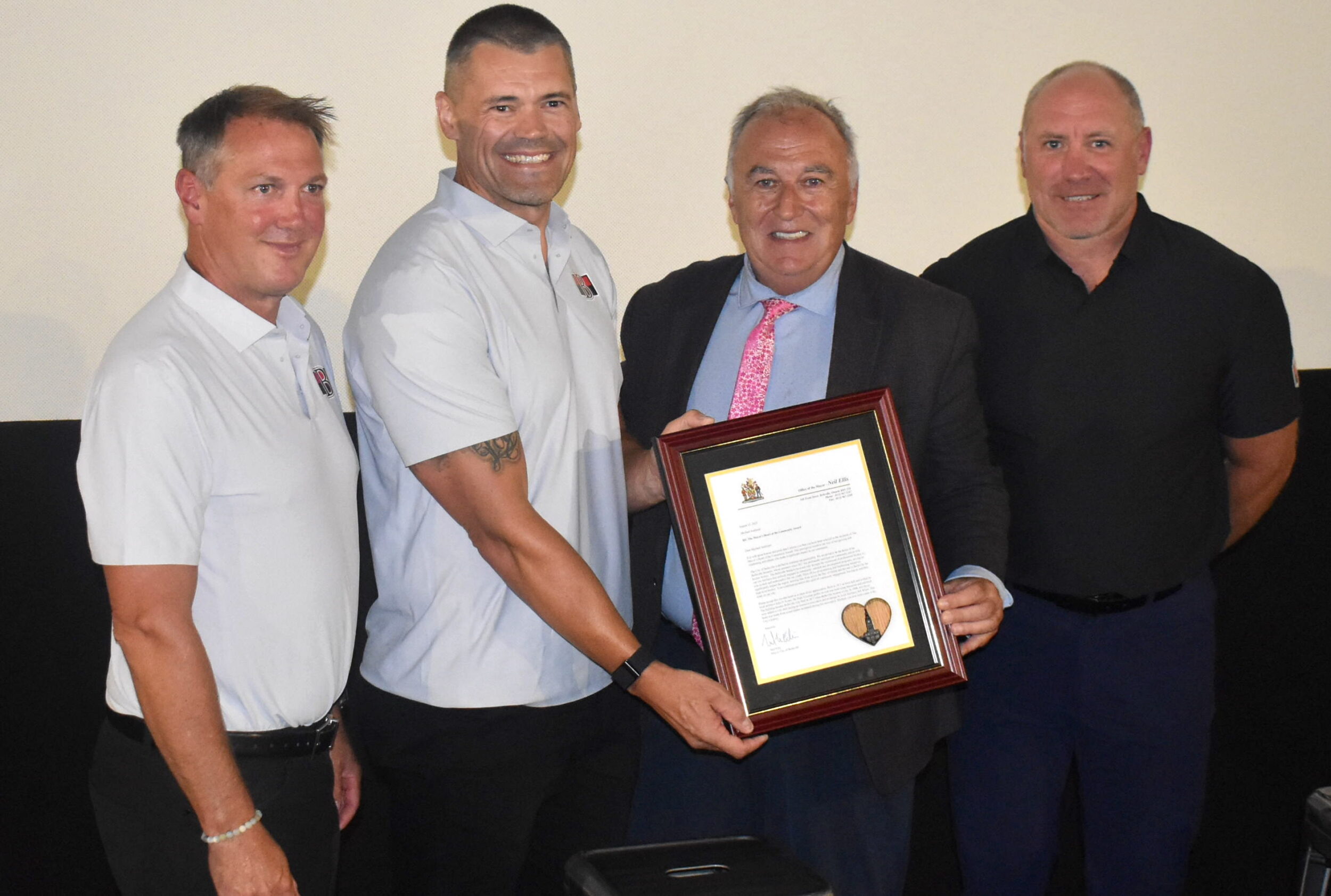 <p>(From Left) Belleville Senators General Manager Matt Turek, Chief Operating Officer John Mather, (Right) Coach David Bell and Belleville Mayor Neil Ellis celebrate the announcement of a three year lease extension between the hockey club and the city. (Jason Parks/Gazette Staff)</p>
