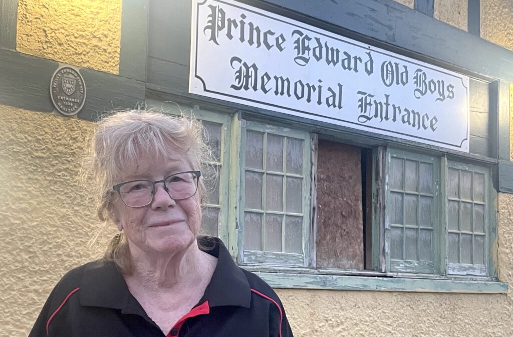 <p>Legion Branch 78 President Diane Kennedy in front of the Prince Edward Oled Boys Memorial Entrance building to the Picton Fairgrounds. (Jason Parks/Gazette Staff)</p>
