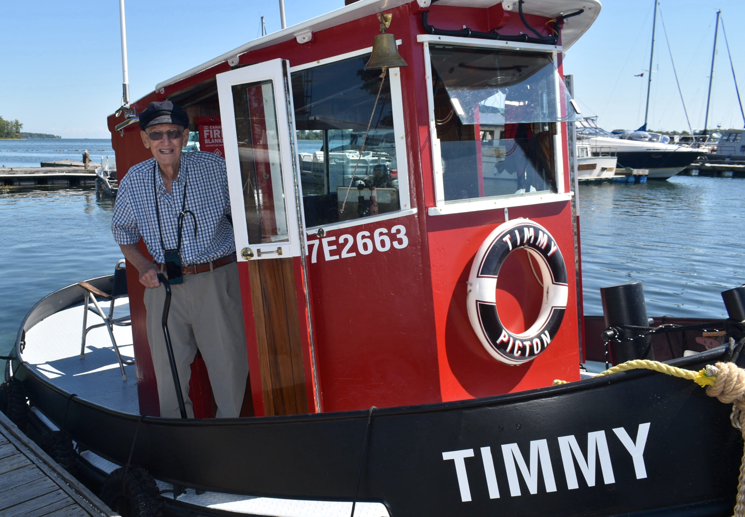 <p>Dr. Bob Clapp and Timmy the Tugboat at Waupoos Marina. (Jason Parks/Gazette Staff)</p>
