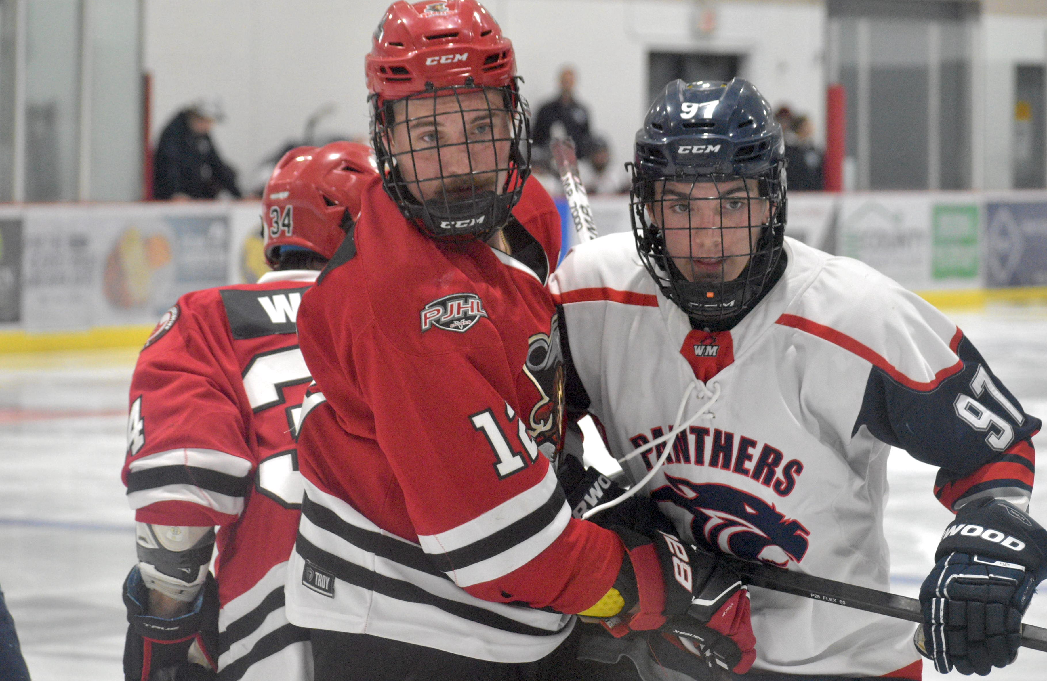 <p>(Left) Picton&#8217;s Colby Leaver fired the game winning goal with under three minutes to play in his club&#8217;s 3-2 win over Port Hope Saturday. (Jason Parks/Gazette Staff)</p>
