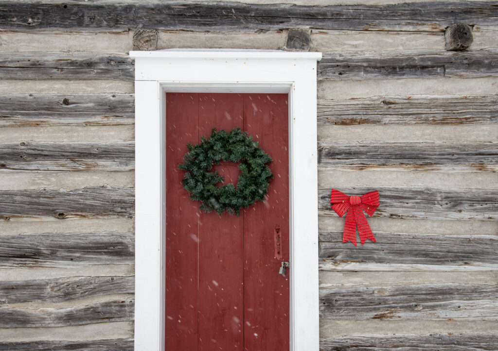 <p>A log cabin at the Ameliasburgh Heritage Village. (Image courtesy of the Christmas in the County House Tour and taken by Phil Norton)</p>
