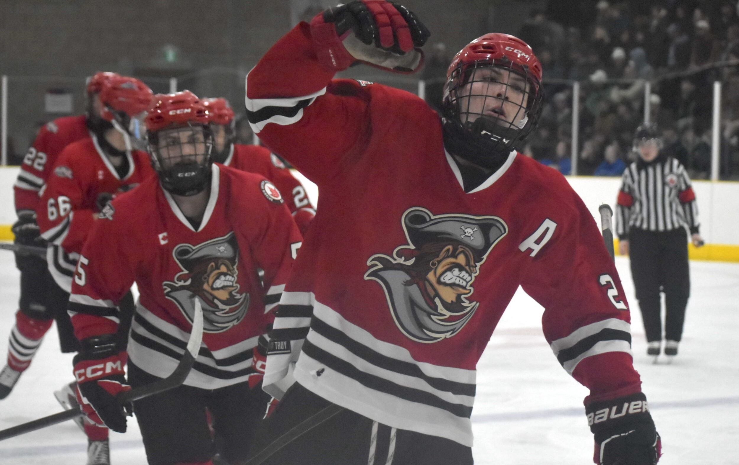 <p>Luc Amat leads the goal train back to the Picton Pirate bench after scoring what would stand as the series winning goal in Game 7 against the host Amherstview Jets on Thursday night. Picton came storming back in the series from a 3-1 deficit to capture the Tod Division Quarterfinal series. (Jason Parks/Gazette Staff)</p>
