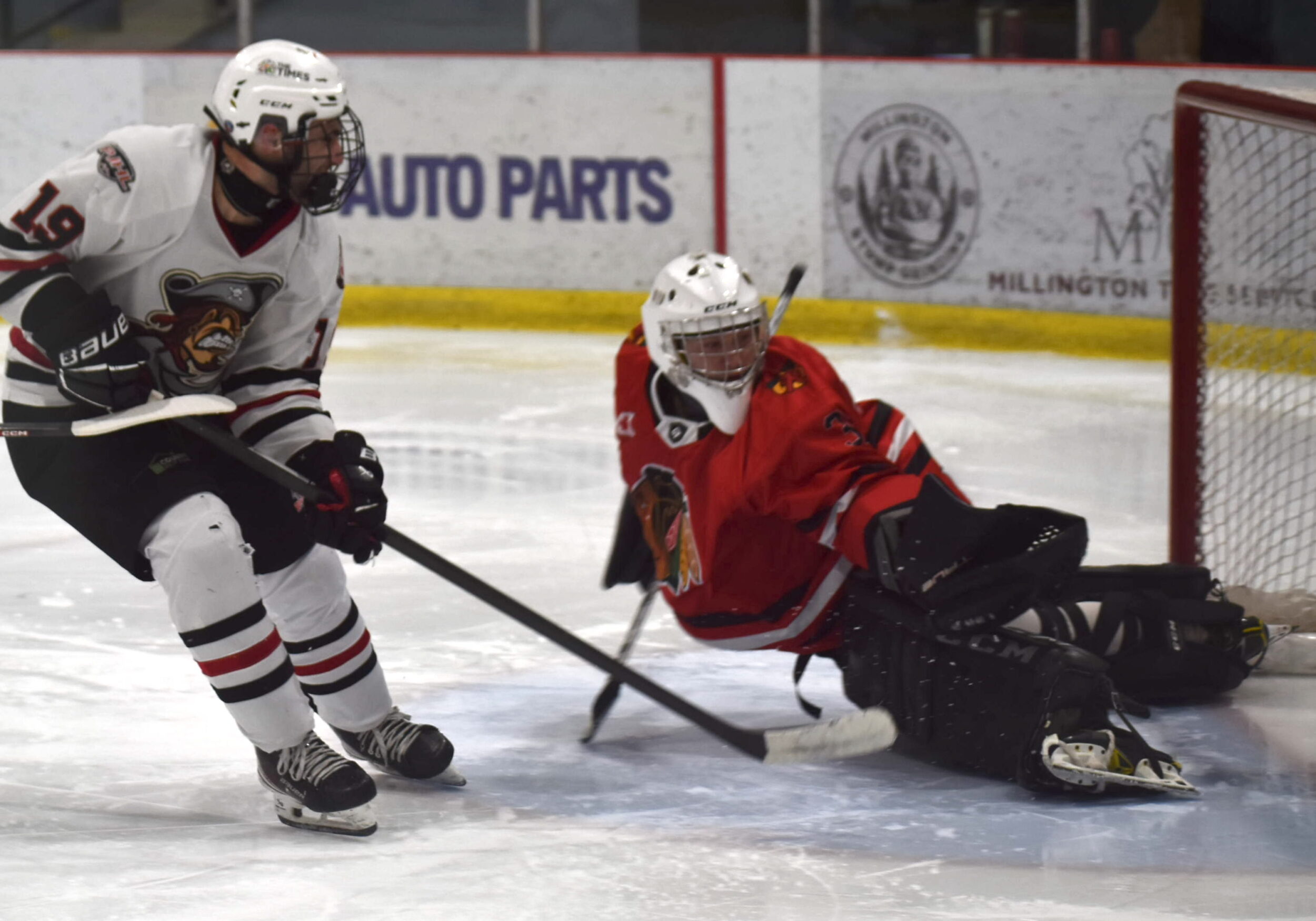 <p>Lakefield Chiefs netminder Braeden Derks lays out to deny Picton’s Keenan Wiles on a breakaway attempt during the second period of Game 4 at Huff Estates Arena Saturday night. (Jason Parks/Gazette Staff)</p>
