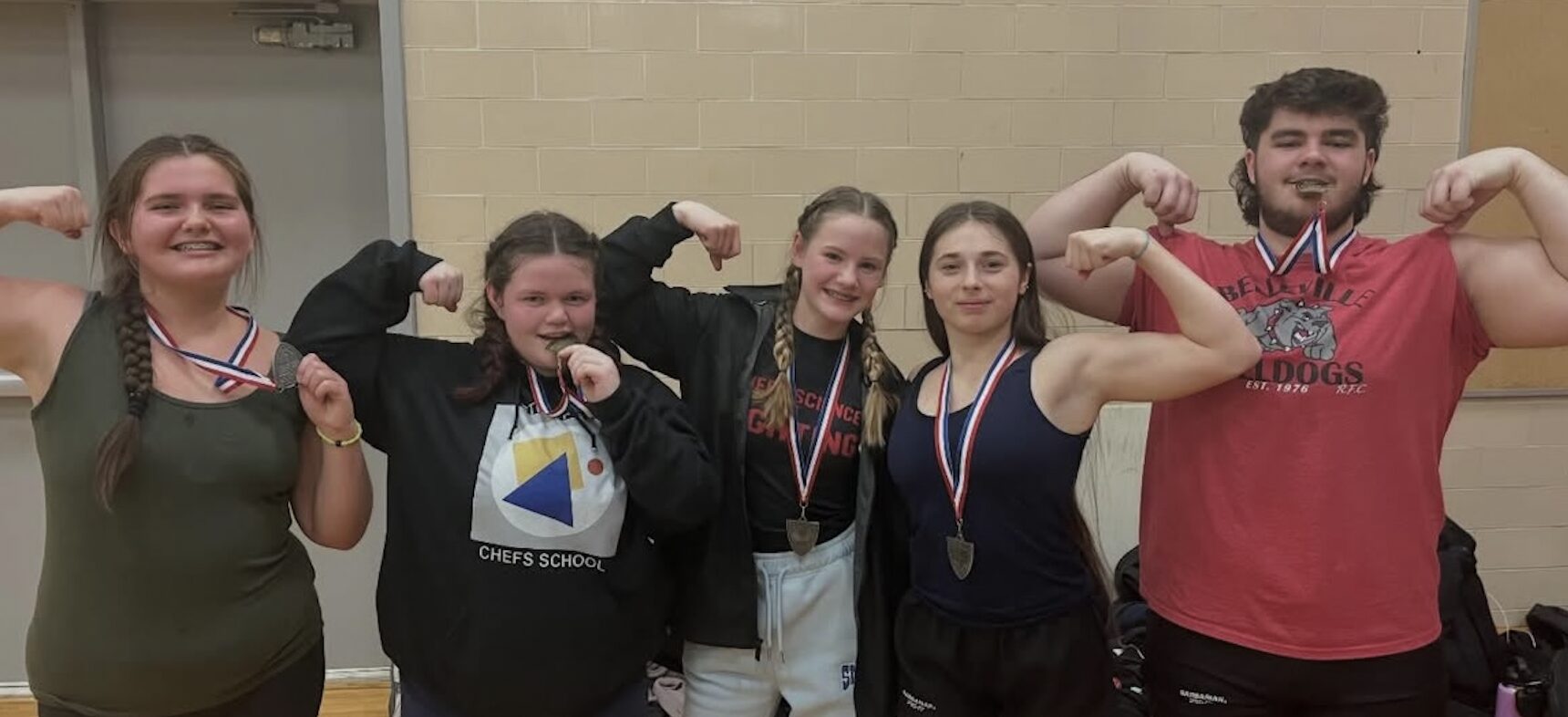 <p>2026  Bay of Quinte Wrestling champions Claire Hunter, Audrey Maracle, Emersyn Bedore, Cassie Mazurski, and Kieran Craig. (Supplied Photo)</p>
