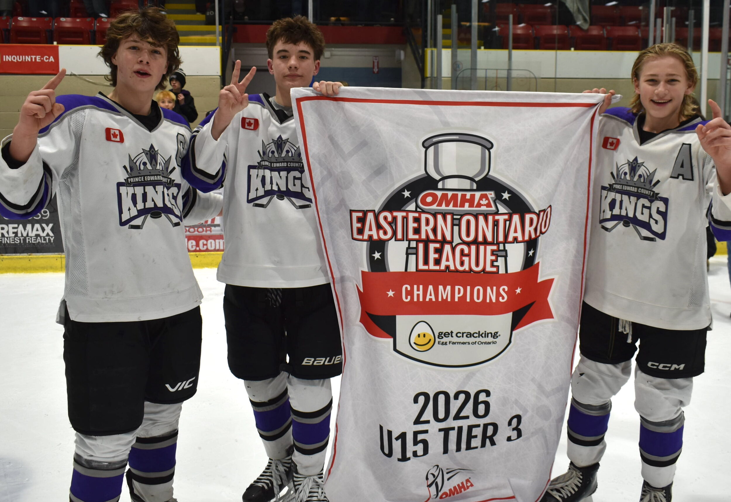<p>U15 Kings captains Nathan Howe, Ryker Ivanic and Will Prinzen with the OMHA Regional banner. (Jason Parks/Gazette Staff)</p>
