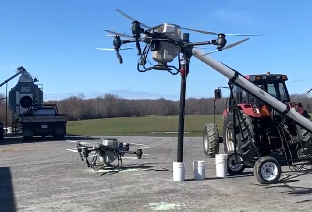 <p>A drone takes to the sky over an Athol ward farm last week. Drone spraying is a new tool farmers are using when weather won’t cooperate. (Supplied Photo)</p>
