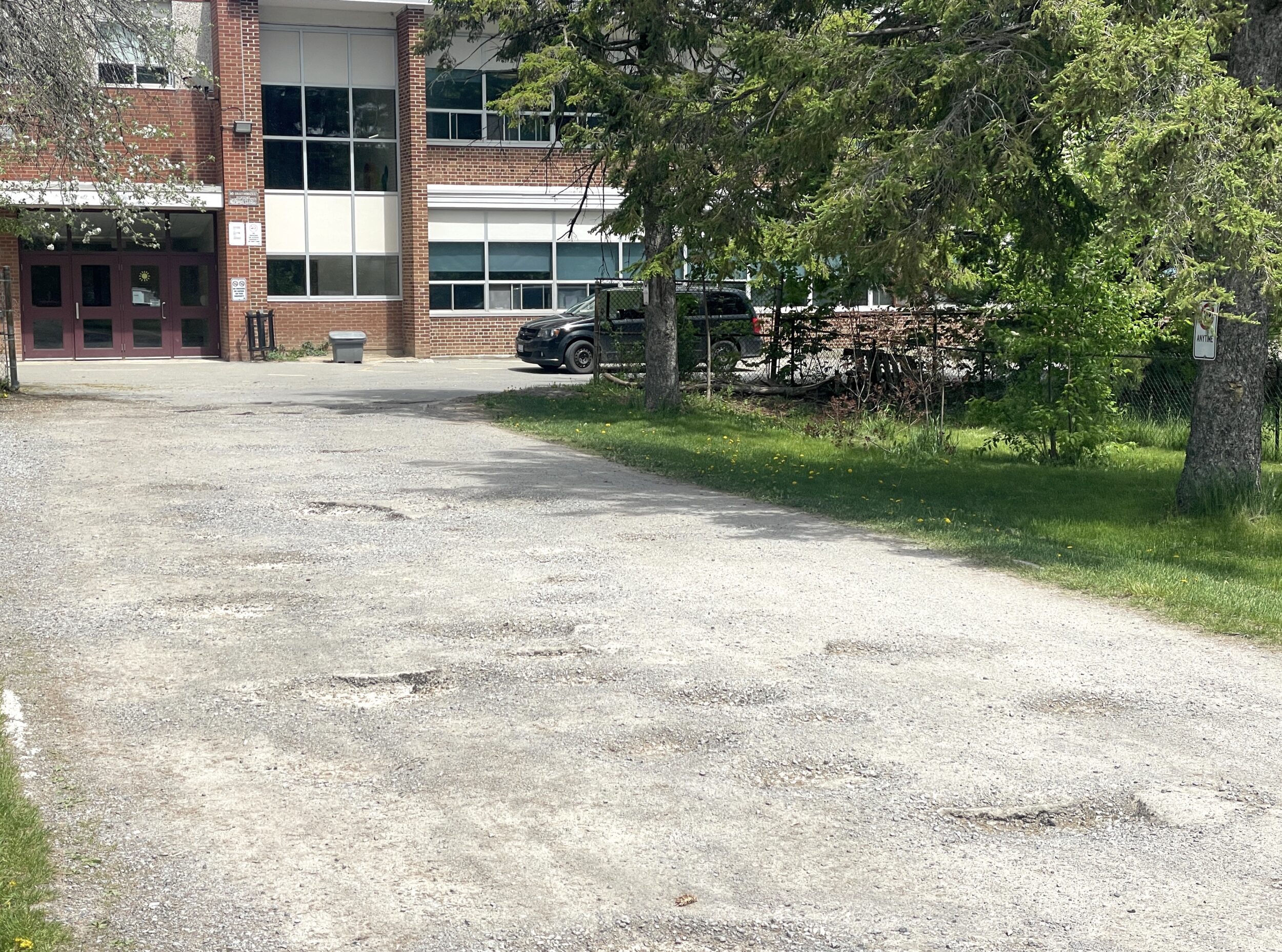 <p>The pockmarked Elm Street laneway that connects PECI to Paul Street is getting a municipal makeover this summer. (Jason Parks/Gazette Staff)</p>
