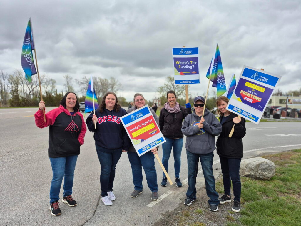 <p>Community Living staff formed a picket line along Highway 62 in Rossmore on Friday (Eleanor Zichy / Gazette Staff)</p>

