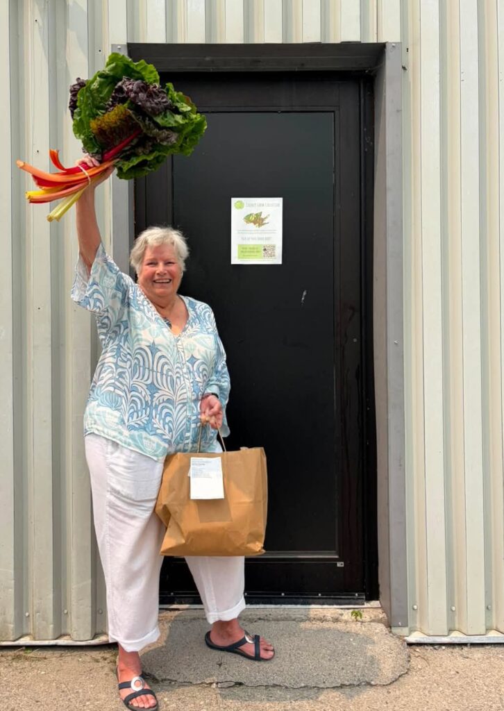 <p>Marilyn Toombs with a champion chard.<br />
(Photo by Natalia Dolan) </p>
