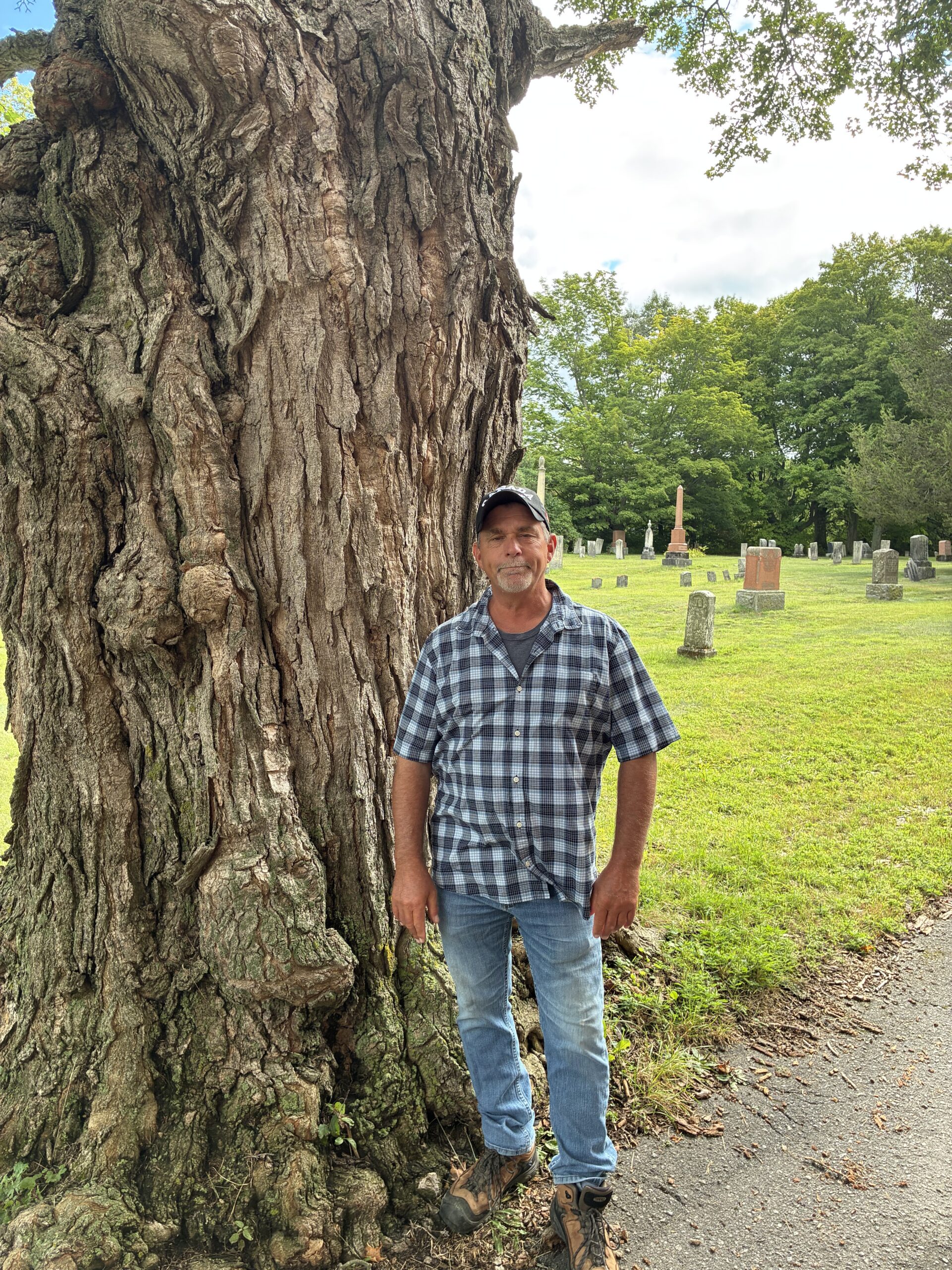 <p>Al DeWitt stands under Cherry Valley Cemetery’s ancient maple. “I can’t think of a finer old lady I’d rather stand beside.” (Chris Fanning/Gazette Staff) </p>
